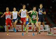 13 August 2014; Ireland's Mark English, second from right, crosses the line to qualify for the final following the men's 800m semi-final event alongside Artur Kuciapski, left, Poland and Pierre-Ambroise Bosse, France. European Athletics Championships 2014 - Day 2. Letzigrund Stadium, Zurich, Switzerland. Picture credit: Stephen McCarthy / SPORTSFILE