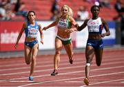 14 August 2014; Ireland's Kelly Proper, centre, crosses the line in fourth place during her heat of the women's 200m event, where she qualified for the semi-final with a time of 23.37. Also pictured are Martina Amidei of Italy, left, and Dina Asher-Smith of Great Britain. European Athletics Championships 2014 - Day 3. Letzigrund Stadium, Zurich, Switzerland. Picture credit: Stephen McCarthy / SPORTSFILE