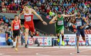 13 August 2014; Emir Bekric of Serbia crosses the line to finish second in his heat of the men's 400m hurdles event from third place Thomas Barr of Ireland and fourth place Yoan Decimus of France, right. European Athletics Championships 2014 - Day 2. Letzigrund Stadium, Zurich, Switzerland. Picture credit: Stephen McCarthy / SPORTSFILE