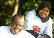 18 October 2006; At a photocall to launch the FAI's Football Against Racism in Europe (FARE) week are Emeka Onwubiko, left, St Kevins Boys and Huda AbdiHaassir Dahir, aged 10, from St.Gabriels NS, Dublin. The FAI encourages all members of the association to make strong efforts to contribute actively to this anti-racism campaign in football. Merrion Square, Dublin. Picture credit: David Maher / SPORTSFILE