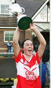 22 October 2006; Fiona Courtney, Donaghmoyne, lifts the Senior cup. Vhi Healthcare Ladies Ulster Senior Club Football Final, Carrickmore, Tyrone,  v Donaghmoyne, Monaghan.  Fintona, Co. Tyrone. Picture credit: Oliver McVeigh / SPORTSFILE