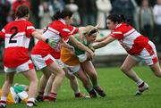 22 October 2006; Elaine Coyle, Carrickmore, in action against Fiona Courtney and Joanne Courtney, Donaghmoyne. Vhi Healthcare Ladies Ulster Senior Club Football Final, Carrickmore, Tyrone,  v Donaghmoyne, Monaghan.  Fintona, Co. Tyrone. Picture credit: Oliver McVeigh / SPORTSFILE
