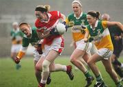 22 October 2006; Amanda Casey, Donaghmoyne, in action against Claire O'Kane and Connie Fox, Carrickmore. Vhi Healthcare Ladies Ulster Senior Club Football Final, Carrickmore, Tyrone, v Donaghmoyne, Monaghan.  Fintona, Co. Tyrone. Picture credit: Oliver McVeigh / SPORTSFILE