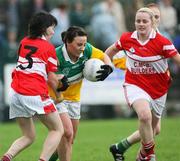 22 October 2006; Aideen Loughran, Carrickmore, in action against Cora Courtney, Donaghmoyne. Vhi Healthcare Ladies Ulster Senior Club Football Final, Carrickmore, Tyrone, v Donaghmoyne, Monaghan. Fintona, Co. Tyrone. Picture credit: Oliver McVeigh / SPORTSFILE