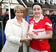 22 October 2006; Catriona McConnell, Donaghmoyne, receives the player of the match from Kathleen Cahill, Vhi Healthcare. Vhi Healthcare Ladies Ulster Senior Club Football Final, Carrickmore, Tyrone, v Donaghmoyne, Monaghan. Fintona, Co. Tyrone. Picture credit: Oliver McVeigh / SPORTSFILE