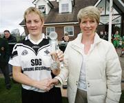 22 October 2006; Brenda McAnespie, Emyvale, receives the player of the match from Vhi Healthcare's Kathleen Cahill. Vhi Healthcare Ladies Ulster Junior Club Football Final, Lissummon, Armagh, v Emyvale, Monaghan. Fintona, Co. Tyrone. Picture credit: Oliver McVeigh / SPORTSFILE
