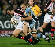 14 October 2006; Kevin Maggs, Ulster, tackled by Mark Lewis, Cardiff Blues. Magners League, Ulster v Cardiff Blues, Ravenhill Park, Belfast. Picture credit: Oliver McVeigh / SPORTSFILE