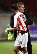 28 September 2006; Derry City manager Stephen Kenny with captain Gary Beckett. UEFA Cup, First round, Second leg, Paris St Germain v Derry City, Parc des Princes, Paris, France. Picture credit: Oliver McVeigh / SPORTSFILE