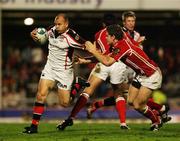 27 October 2006; Scott Young, Ulster, is tackled by Gavin Evans, Llanelli Scarlets. Heineken Cup 2006-2007, Pool 5, Round 2, Llanelli Scarlets v Ulster, Stradey Park, Llanelli, Wales. Picture credit: Oliver McVeigh / SPORTSFILE