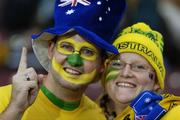 28 October 2006; Australian fans Shannon Murne, left, and Samantha Rasmuggen, from the Gold Coast, cheer on their side. Coca-Cola International Rules Series 2006, First Test, Ireland v Australia, Pearse Stadium, Galway. Picture credit: Brendan Moran / SPORTSFILE