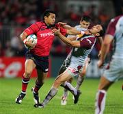 28 October 2006; Lifeimi Mafi, Munster, is tackled by Sebastienn Laloo, Bourgoin. Heineken Cup 2006-2007, Pool 4, Round 2, Munster v Bourgoin, Thomond Park, Limerick. Picture credit: Kieran Clancy / SPORTSFILE