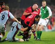 28 October 2006; Trevor Halstead and John Hayes, Munster, are tackled by Rudolph Coetzee, Bourgoin. Heineken Cup 2006-2007, Pool 4, Round 2, Munster v Bourgoin, Thomond Park, Limerick. Picture credit: Kieran Clancy / SPORTSFILE