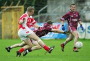 29 October 2006: Stephen Hickey, Eire Og, scores a goal past Cathal Hill, Lissycasey. Clare Senior Football Championship Final, Eire Og v Lissycasey, Cusack Park, Ennis, Co. Clare. Picture credit: Kieran Clancy / SPORTSFILE