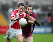 29 October 2006: Alan Malone, Eire Og, in action against Cathal McMahon, Lissycasey. Clare Senior Football Championship Final, Eire Og v Lissycasey, Cusack Park, Ennis, Co. Clare. Picture credit: Kieran Clancy / SPORTSFILE