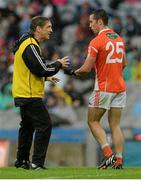 2 August 2014; Armagh assistant manager Kieran McGeeney talks with Aaron Kernan during the game. GAA Football All-Ireland Senior Championship, Round 4A, Meath v Armagh, Croke Park, Dublin. Picture credit: Piaras O Midheach / SPORTSFILE