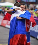 15 August 2014; Ivan Noskov of Russia, right, who finished in third place embraces Matej Toth of Slovakia, left, who finished in second place, following the men's 50k walk. European Athletics Championships 2014 - Day 4. Zurich, Switzerland. Picture credit: Stephen McCarthy / SPORTSFILE