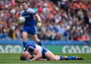 9 August 2014; Monaghan's Colin Walshe lies injured early in the first half. GAA Football All-Ireland Senior Championship, Quarter-Final, Dublin v Monaghan, Croke Park, Dublin. Picture credit: Ramsey Cardy / SPORTSFILE