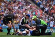 9 August 2014; Monaghan's Colin Walshe is attended to after receiving an injury in the first half. GAA Football All-Ireland Senior Championship, Quarter-Final, Dublin v Monaghan, Croke Park, Dublin. Picture credit: Ramsey Cardy / SPORTSFILE