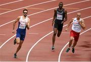 15 August 2014; Martyn Rooney of Great Britain, left, on his way to winning the final of the men's 400m event. Also pictured are Donald Sanford of Israel, centre, and Jakub Krzewina of Poland, right. European Athletics Championships 2014 - Day 4. Letzigrund Stadium, Zurich, Switzerland. Picture credit: Stephen McCarthy / SPORTSFILE
