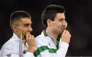 15 August 2014; Ireland's Mark English celebrates with his bronze medal after the men's 800m final event. English finished with a season best time of 1:45.03. Also pictured is gold medallist Adam Kszcot of Poland. European Athletics Championships 2014 - Day 4. Letzigrund Stadium, Zurich, Switzerland. Picture credit: Stephen McCarthy / SPORTSFILE