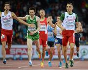 15 August 2014; Ireland's Mark English crosses the line to finish in third place and win a bronze medal in the men's 800m event, with a season best time of 1:45.03. European Athletics Championships 2014 - Day 4. Letzigrund Stadium, Zurich, Switzerland. Picture credit: Stephen McCarthy / SPORTSFILE