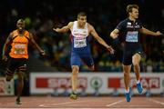 15 August 2014; Adam Gemili of Great Britain, centre, wins the final of the men's 200m event, from second place Christophe Lemaitre of France, right, and fourth place Churandy Martina of the Netherlands, left. European Athletics Championships 2014 - Day 4. Letzigrund Stadium, Zurich, Switzerland. Picture credit: Stephen McCarthy / SPORTSFILE