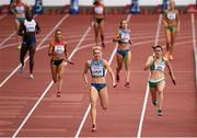16 August 2014; Phil Healy, right, runs the anchor leg of Ireland's 4x100m women's relay team where they finished 4th and set a new national record time of 43.84 during their round 1 heat. The team consisted of Amy Foster, Kelly Proper, Sarah Lavin and Phil Healy. European Athletics Championships 2014 - Day 5. Letzigrund Stadium, Zurich, Switzerland. Picture credit: Stephen McCarthy / SPORTSFILE