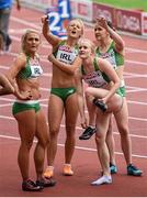 16 August 2014; The Ireland 4x100m women's relay team, from left, Kelly Proper, Sarah Lavin, Amy Foster and Phil Healy watch the scoreboard after they set a new national record time of 43.84 during their round 1 heat. European Athletics Championships 2014 - Day 5. Letzigrund Stadium, Zurich, Switzerland. Picture credit: Stephen McCarthy / SPORTSFILE