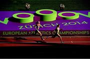 16 August 2014; Competitors during the women's 4x400m qualifying. European Athletics Championships 2014 - Day 5. Letzigrund Stadium, Zurich, Switzerland. Picture credit: Stephen McCarthy / SPORTSFILE