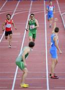 16 August 2014; Brian Gregan running the opening leg looks to change over with Brian Murphy for Ireland during their 4x400m qualifying heat. The team, which finished third and qualified for tomorrow's final, in a new national record time of 3:03.57, also included Richard Morrissey and Thomas Barr. European Athletics Championships 2014 - Day 5. Letzigrund Stadium, Zurich, Switzerland. Picture credit: Stephen McCarthy / SPORTSFILE