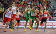 16 August 2014; Richard Morrissey running the second last leg take the baton from Brian Murphy for Ireland during their 4x400m qualifying heat. The team, which finished third and qualified for tomorrow's final, in a new national record time of 3:03.57, also included Brian Gregan and Thomas Barr. European Athletics Championships 2014 - Day 5. Letzigrund Stadium, Zurich, Switzerland. Picture credit: Stephen McCarthy / SPORTSFILE