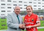 16 August 2014; Rena Buckey, Cork,  is presented with the Player of the Match by Pat Quill, President, Ladies Gaelic Football. TG4 All-Ireland Ladies Football Senior Championship, Quarter-Final, Cork v Mayo, O'Connor Park, Tullamore, Co. Offaly. Picture credit: Piaras O Midheach / SPORTSFILE