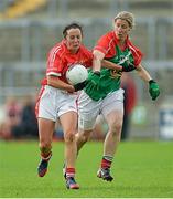 16 August 2014; Geraldine O'Flynn, Cork, in action against Cora Staunton, Mayo. TG4 All-Ireland Ladies Football Senior Championship, Quarter-Final, Cork v Mayo, O'Connor Park, Tullamore, Co. Offaly. Picture credit: Piaras O Midheach / SPORTSFILE