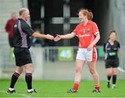 16 August 2014; Cork's Rena Buckley shakes hands with referee Gavin Corrigan after the game. TG4 All-Ireland Ladies Football Senior Championship, Quarter-Final, Cork v Mayo, O'Connor Park, Tullamore, Co. Offaly. Picture credit: Piaras O Midheach / SPORTSFILE