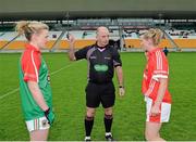 16 August 2014; Referee Gavin Corrigan with captains Fiona McHale, left, Mayo, and Briege Corkery, Cork. TG4 All-Ireland Ladies Football Senior Championship, Quarter-Final, Cork v Mayo, O'Connor Park, Tullamore, Co. Offaly. Picture credit: Piaras O Midheach / SPORTSFILE