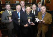 23 October 2006; Fr. Brian D'Arcy with, from left, Brian Carthy, former Taoiseach Albert Reynolds, Armagh football manager Joe Kernan, Tyrone football manager Mickey Harte, former Kerry footballer Donnie Sullivan and singer Joe Dolan at the launch of his book 'A Different Journey'. Citywest Hotel, Saggart, Dublin. Picture credit; Pat Murphy / SPORTSFILE