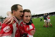 29 October 2006: Brian Frawley and Alan Malone, captain, Eire Og, celebrate victory. Clare Senior Football Championship Final, Eire Og v Lissycasey, Cusack Park, Ennis, Co. Clare. Picture credit: Kieran Clancy / SPORTSFILE