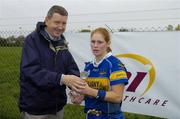 29 October 2006; Louise McKeever, Seneschalstown, is presented with the player of the match award by John Kane, VHI Corporate Accounts Manager. Vhi Healthcare Ladies Leinster Senior Club Football Final, Seneschalstown, Meath v Ballyboden St. Endas, Dublin, Clane GAA, Co. Kildare. Picture credit: Pat Murphy / SPORTSFILE