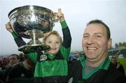29 October 2006; Nemo Rangers goalkeeper Don Heaphy celebrates with his 4 year old daughter Gemma after the win against Doheny's. Cork Senior Football Championship Final, Nemo Rangers v Doheny's, Pairc Ui Chaoimh, Cork. Picture credit: Matt Browne / SPORTSFILE
