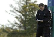 31 October 2006; Head Coach Eddie O'Sullivan checks his notes during Ireland rugby squad training. St. Gerard's School, Bray, Co. Wicklow. Picture credit: Pat Murphy / SPORTSFILE