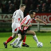 31 October 2006; Ciaran Martyn, Derry City, in action against Conor O'Grady, Sligo Rovers. Carlsberg FAI Cup, Semi-Final Replay, Derry City v Sligo Rovers. Brandywell, Derry. Picture credit: Oliver McVeigh / SPORTSFILE