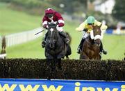 4 November 2006; Beef or Salmon, with Andrew McNamara up, right, is headed by War Of Attrition, Conor O'Dwyer up, before winning the James Nicholson Wine Merchant Champion Chase. Down Royal Racecourse, Maze, Lisburn, Co Down. Picture credit: SPORTSFILE