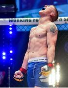 16 August 2014; Paul Redmond celebrates after submitting Alexis Savvidis in Round 2 of their lightweight bout. Cage Warriors 70 Fight Night, The Helix, Dublin. Picture credit: Ramsey Cardy / SPORTSFILE