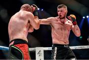 16 August 2014; Karl Moore, right, in action against Lloyd Clarkson during their light-heavyweight bout. Cage Warriors 70 Fight Night, The Helix, Dublin. Picture credit: Ramsey Cardy / SPORTSFILE