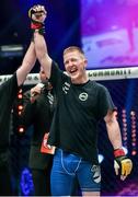 16 August 2014; Paul Redmond celebrates after submitting Alexis Savvidis in Round 2 of their lightweight bout. Cage Warriors 70 Fight Night, The Helix, Dublin. Picture credit: Ramsey Cardy / SPORTSFILE