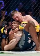 16 August 2014; Joseph Duffy, right, submits Damien Lapilus in Round 3 of their lightweight bout. Cage Warriors 70 Fight Night, The Helix, Dublin. Picture credit: Ramsey Cardy / SPORTSFILE