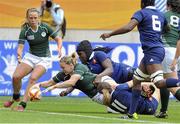 17 August 2014; Niamh Briggs, Ireland, scores her side's first try of the match after 6 minutes. 2014 Women's Rugby World Cup 3rd / 4th place Play-off, Ireland v France. Stade Jean Bouin, Paris, France. Picture credit: Aurelien Meunier / SPORTSFILE