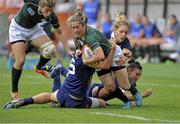 17 August 2014; Alison Miller, Ireland, attempts to break through a French tackle. 2014 Women's Rugby World Cup 3rd / 4th place Play-off, Ireland v France. Stade Jean Bouin, Paris, France. Picture credit: Aurelien Meunier / SPORTSFILE