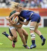 17 August 2014; Ashleigh Baxter, Ireland, attempts to break through the French defensive line. 2014 Women's Rugby World Cup 3rd / 4th place Play-off, Ireland v France. Stade Jean Bouin, Paris, France. Picture credit: Aurelien Meunier / SPORTSFILE