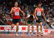17 August 2014; Ireland's Mark English holds hid leg during their 4x400m men's relay final where they finished 5th in a new national record time of 3:01.67. The team consisted of Brian Gregan, Mark English, David Morrissey and Thomas Barr. European Athletics Championships 2014 - Day 6. Letzigrund Stadium, Zurich, Switzerland. Picture credit: Stephen McCarthy / SPORTSFILE